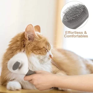 Brushing a long-haired cat with a self-cleaning slicker brush