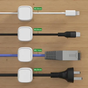 Magnetic cable clips shown with cables of different thicknesses