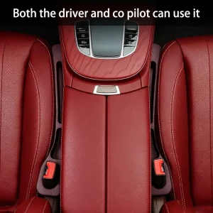 Two car seat gap fillers beside the center console in a car with red seats