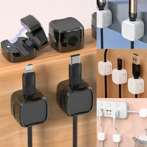 Black magnetic cable clips holding USB-C and Lightning cables